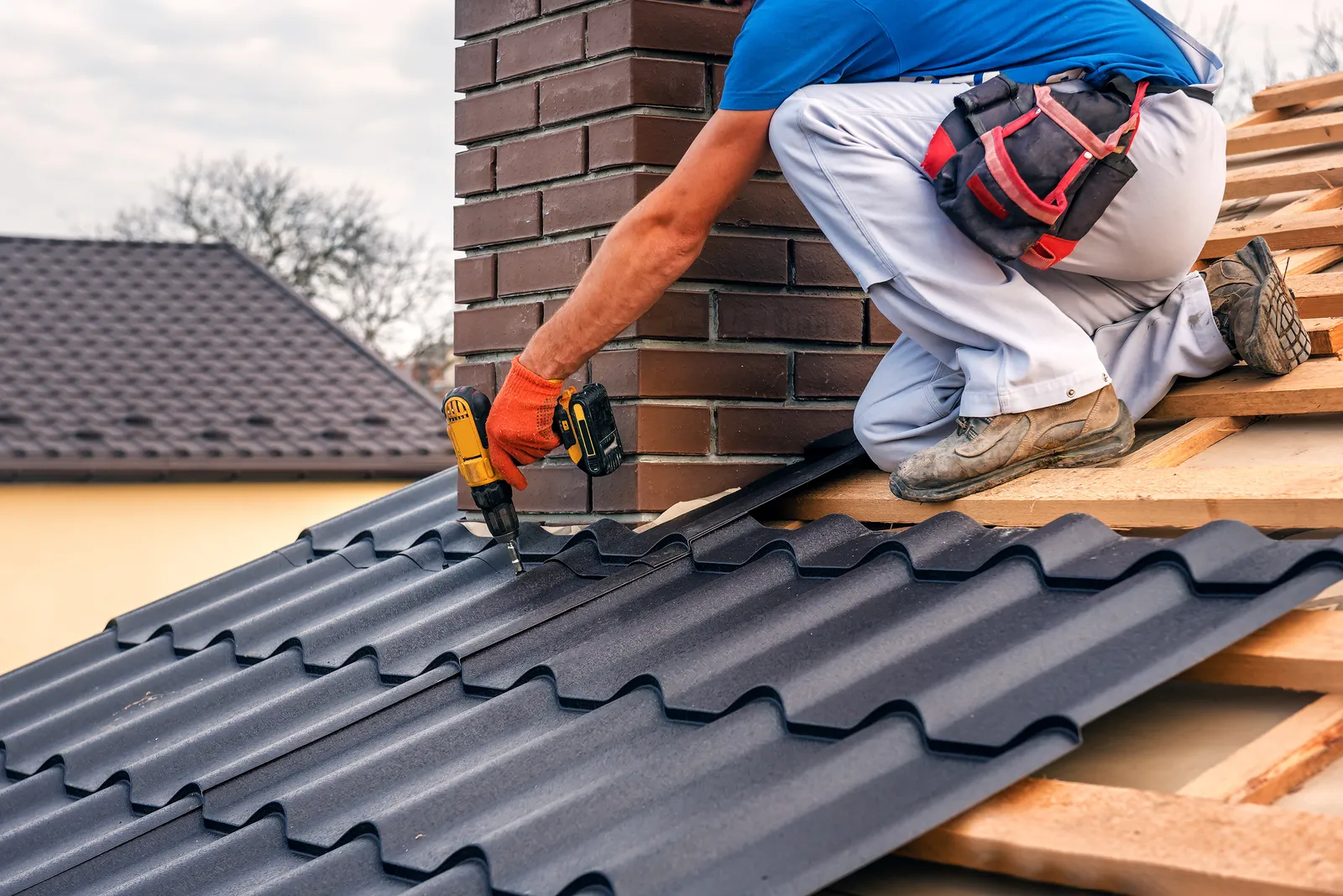 Commercial metal tile roof installation fitter chimney