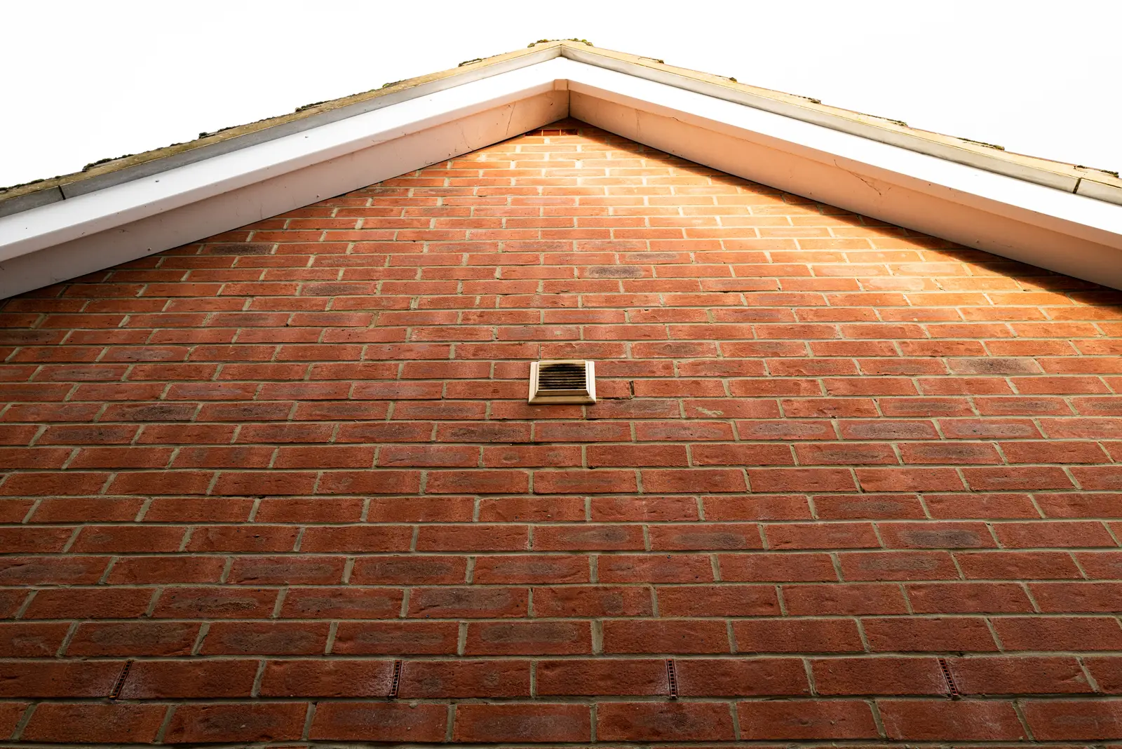 Fascia soffit white upvc bargeboard on brick gable