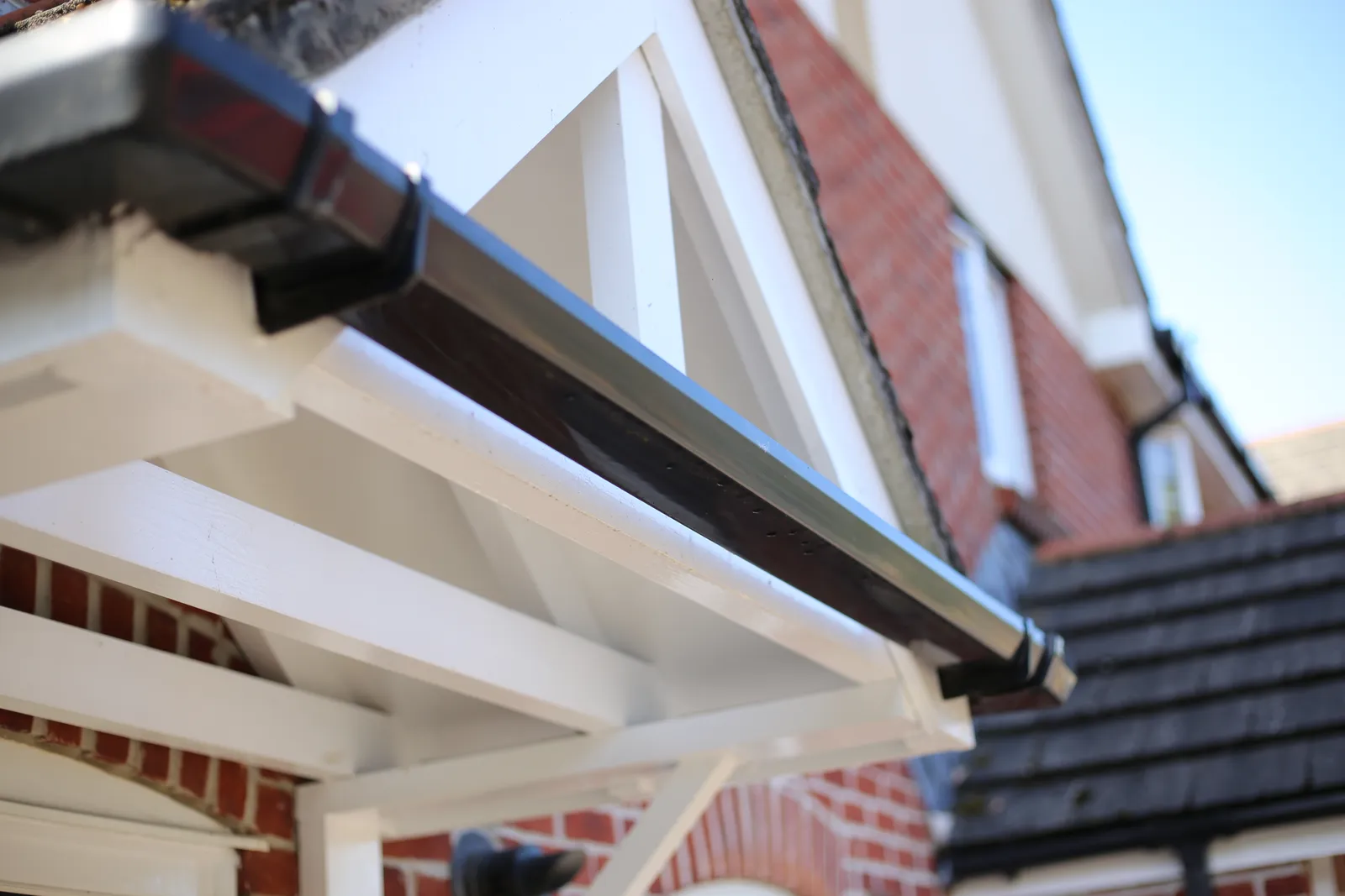 Black guttering porch gable detail