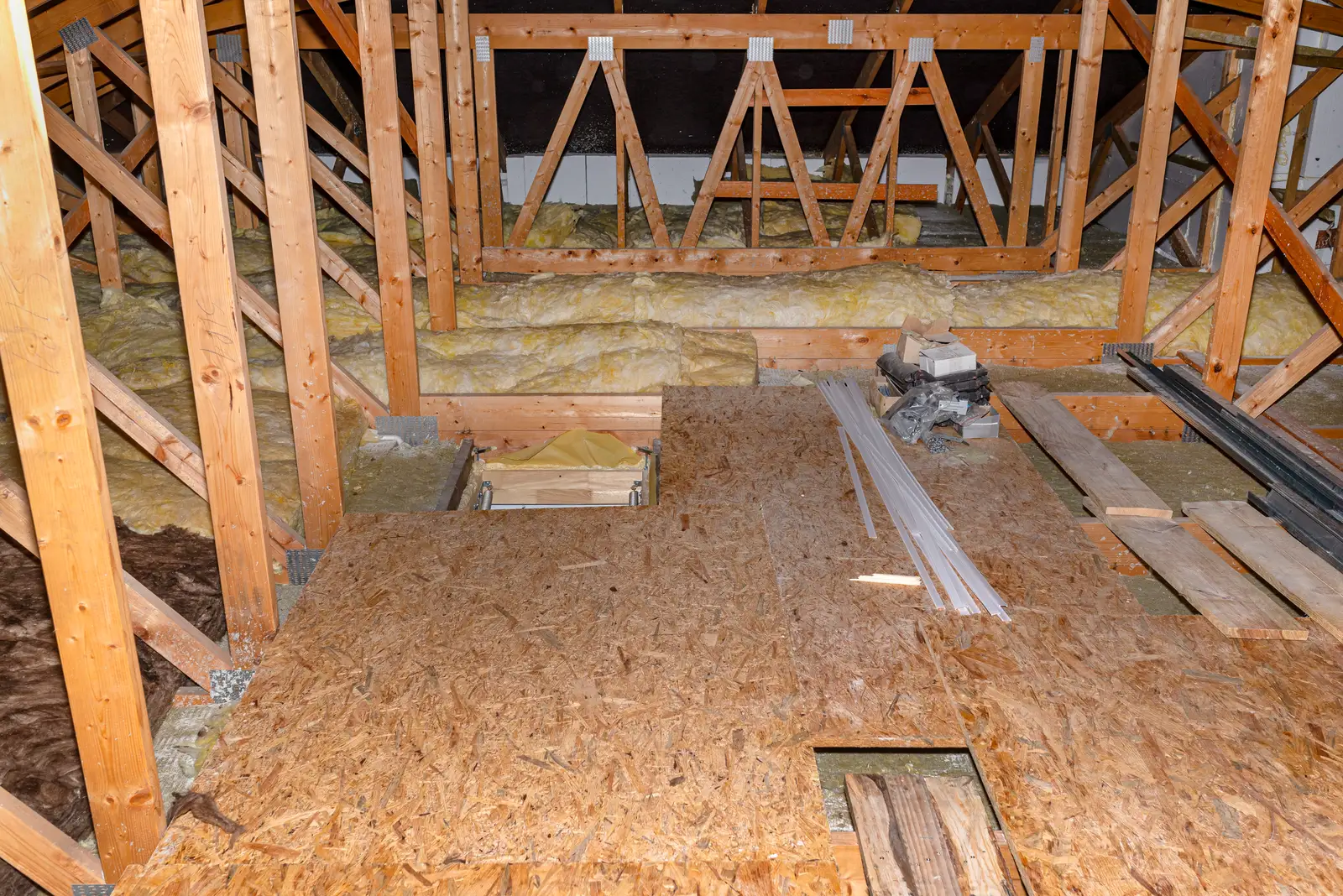 Loft boarding raised loft boards over insulation