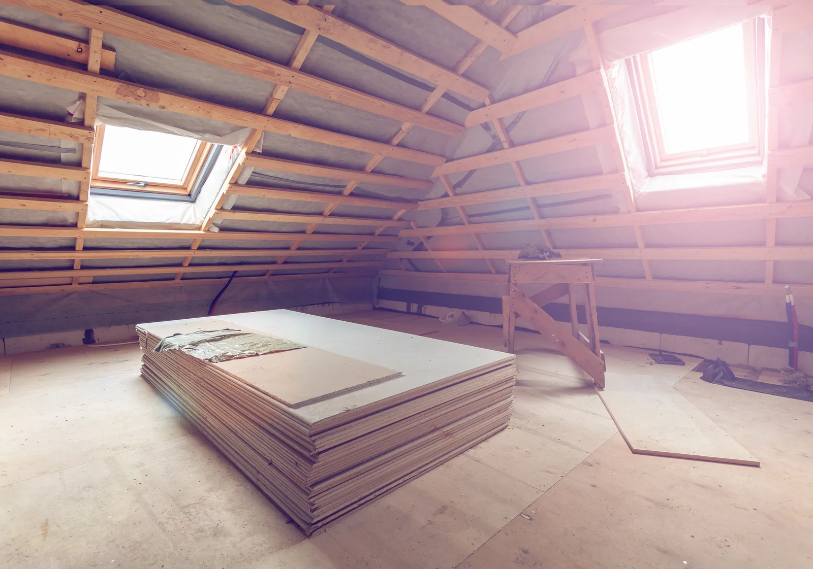 Loft boarding storage decking boards stacked in loft