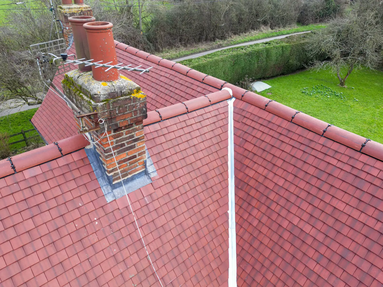 Tiled slate red clay tile roof ridge tiles chimney